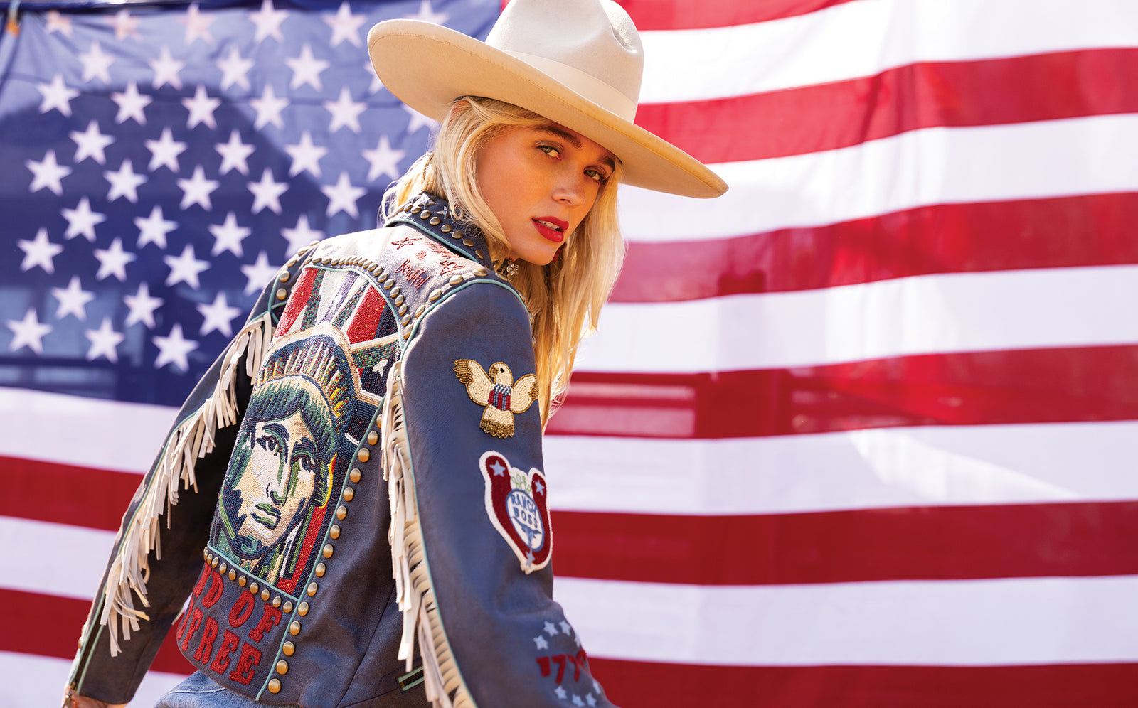 Haley wearing the Lady Liberty Biker Jacket with a vintage Double D Ranch hat.