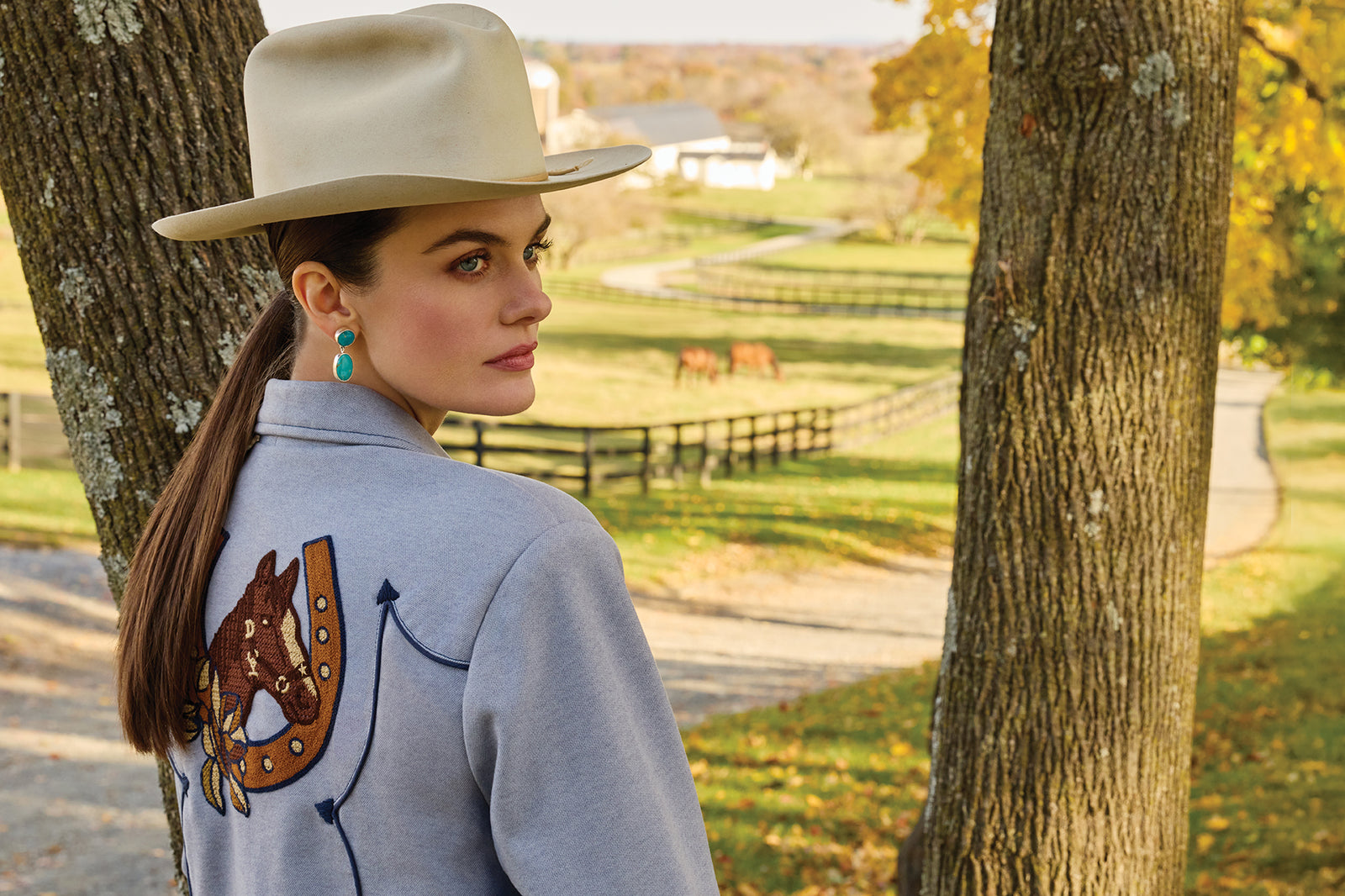 Kaylin wearing the Meadows Sweet Jacket with Double D Ranch jewelry and a vintage hat.
