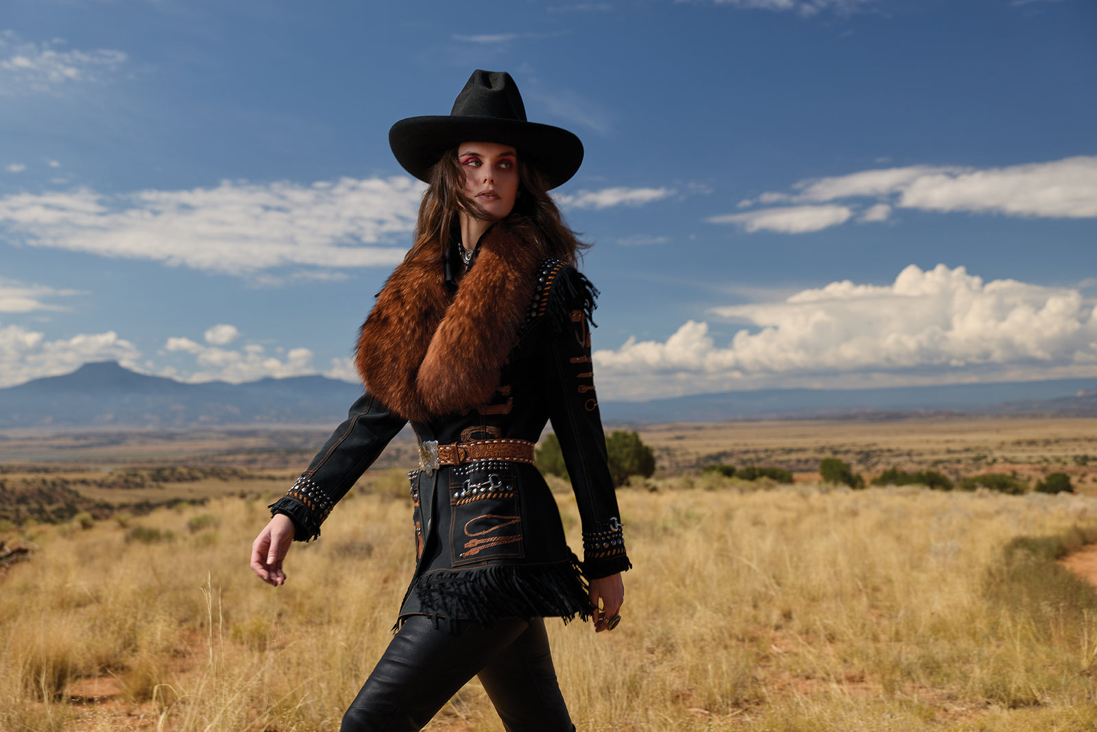 Kaylin wearing the Tucker's Tack Jacket with the Black Bandit Pants, and styled with vintage Double D Ranch Accessories.