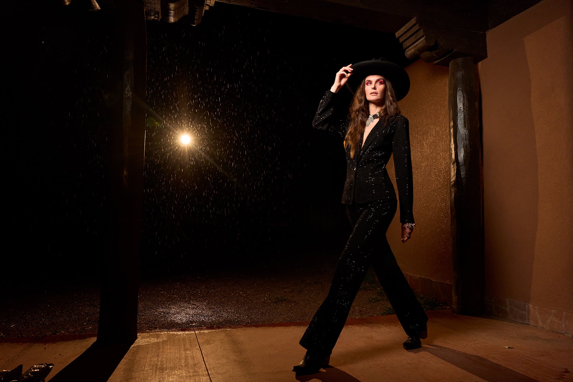 Kaylin wearing the Stars at Night Blazer and Pant set with a Mummy's Bundle Necklace and Double D Ranch Accessories