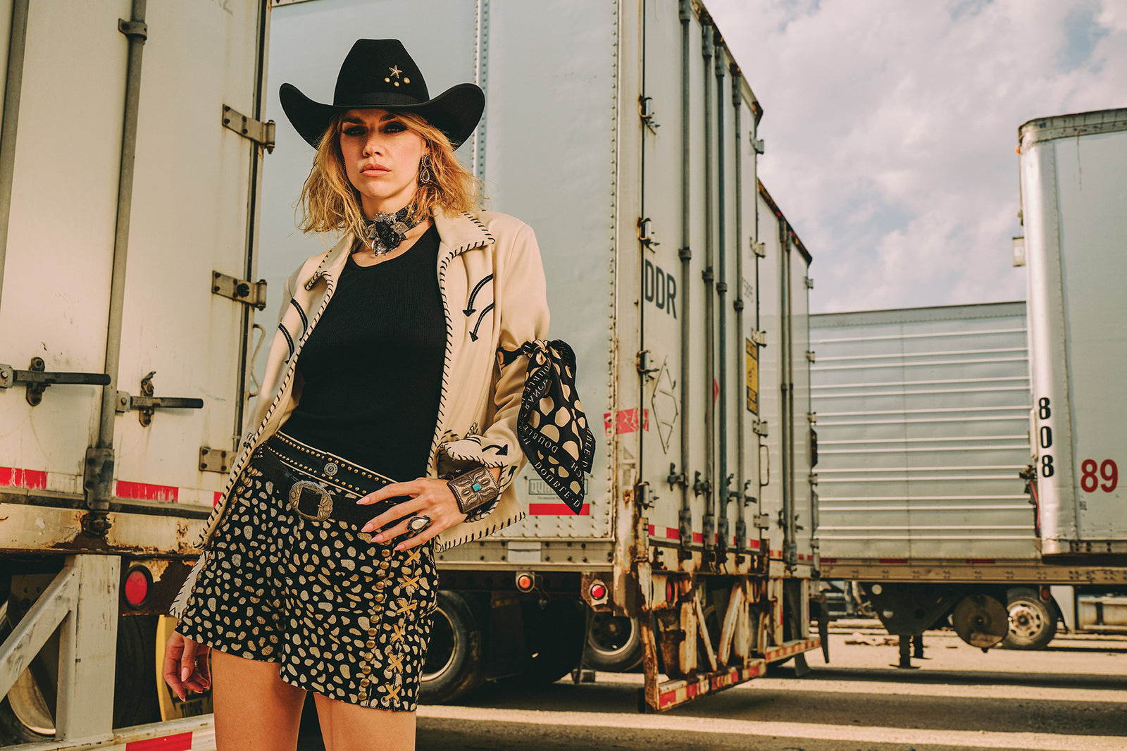 Lozzie wearing the Underground Hootenanny Jacket with the Howdy Dotty Short and Scarf with Double D Ranch Jewelry and Accessories.
