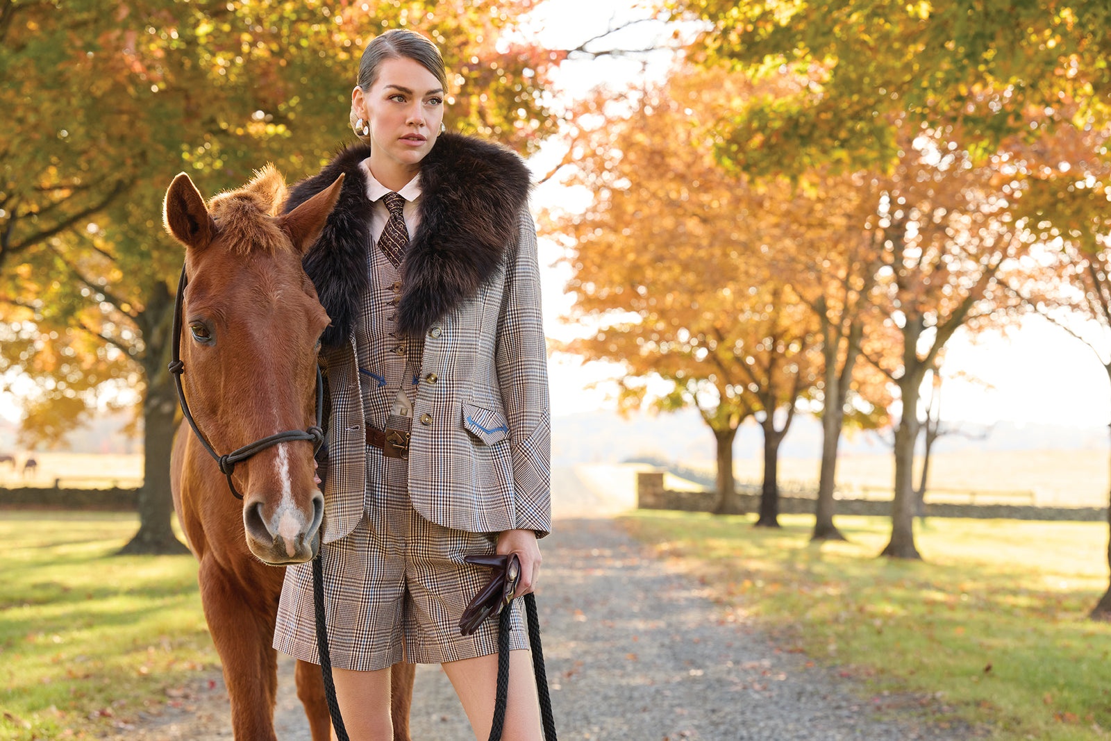 Lozzy wearing the Riding Habit Jacket and Vest with the Odie Western Top, the Riding Habit Short, and vintage Double D Ranch Accessories.