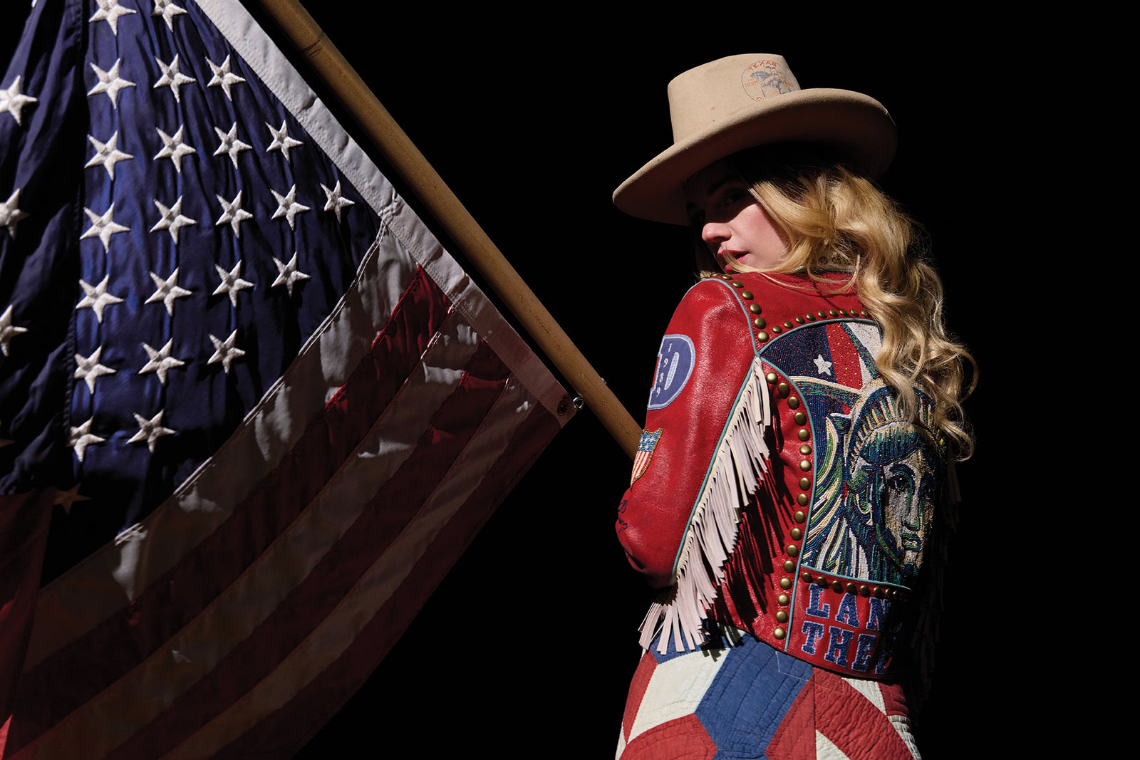 Lozzie wearing the Lady Liberty Biker Jacket with the Lady Liberty Skirt and vintage Double D Ranch Accessories.