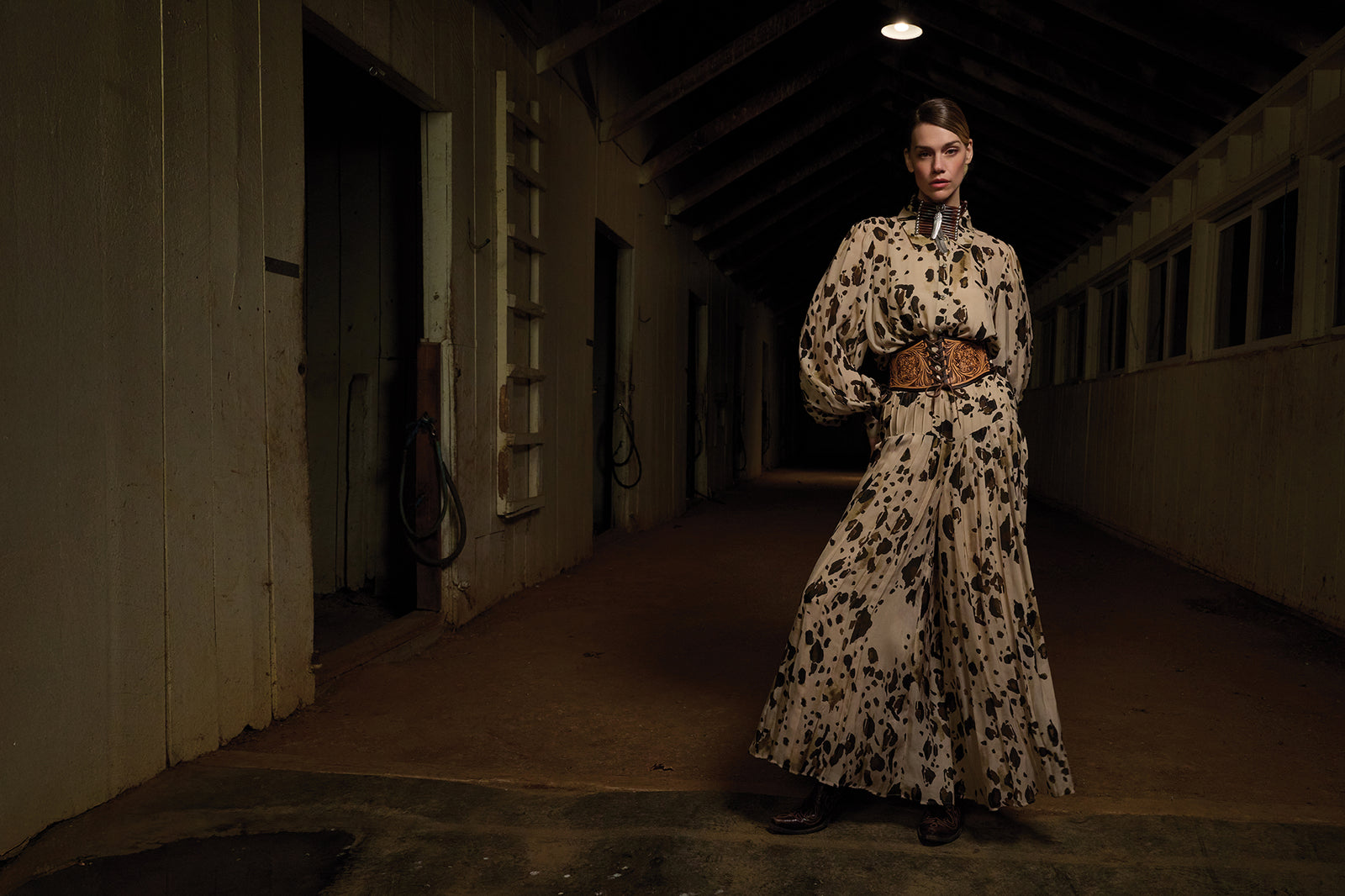 Lozzy wearing the Chrome Blouse and Pant paired with a stunning Mummy's Bundle Necklace and the Cowboy Corset Belt.