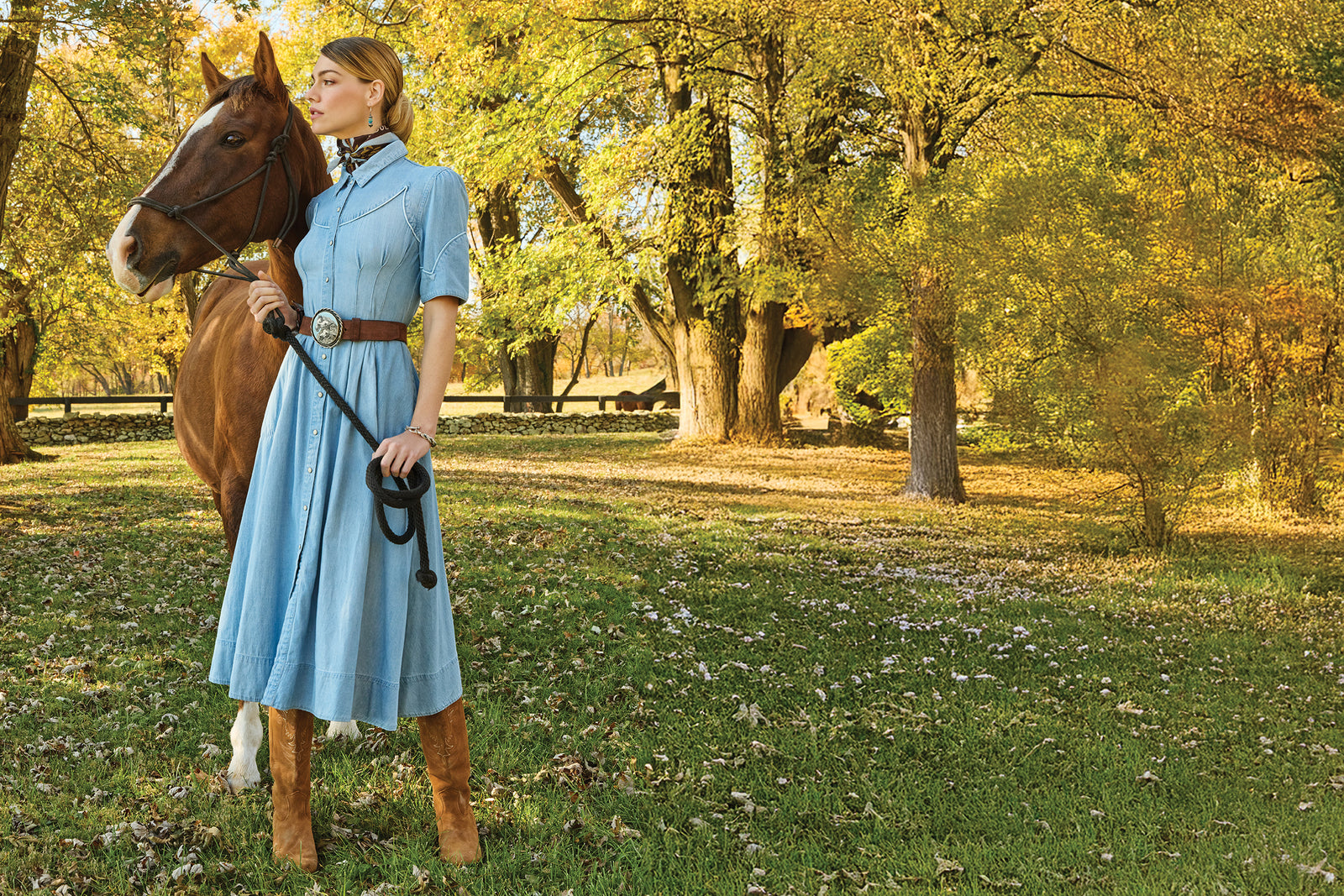 Lozzy wearing the Buckskin Blues Denim Dress with vintage accessories and jewelry with Long Tall Sally boots.